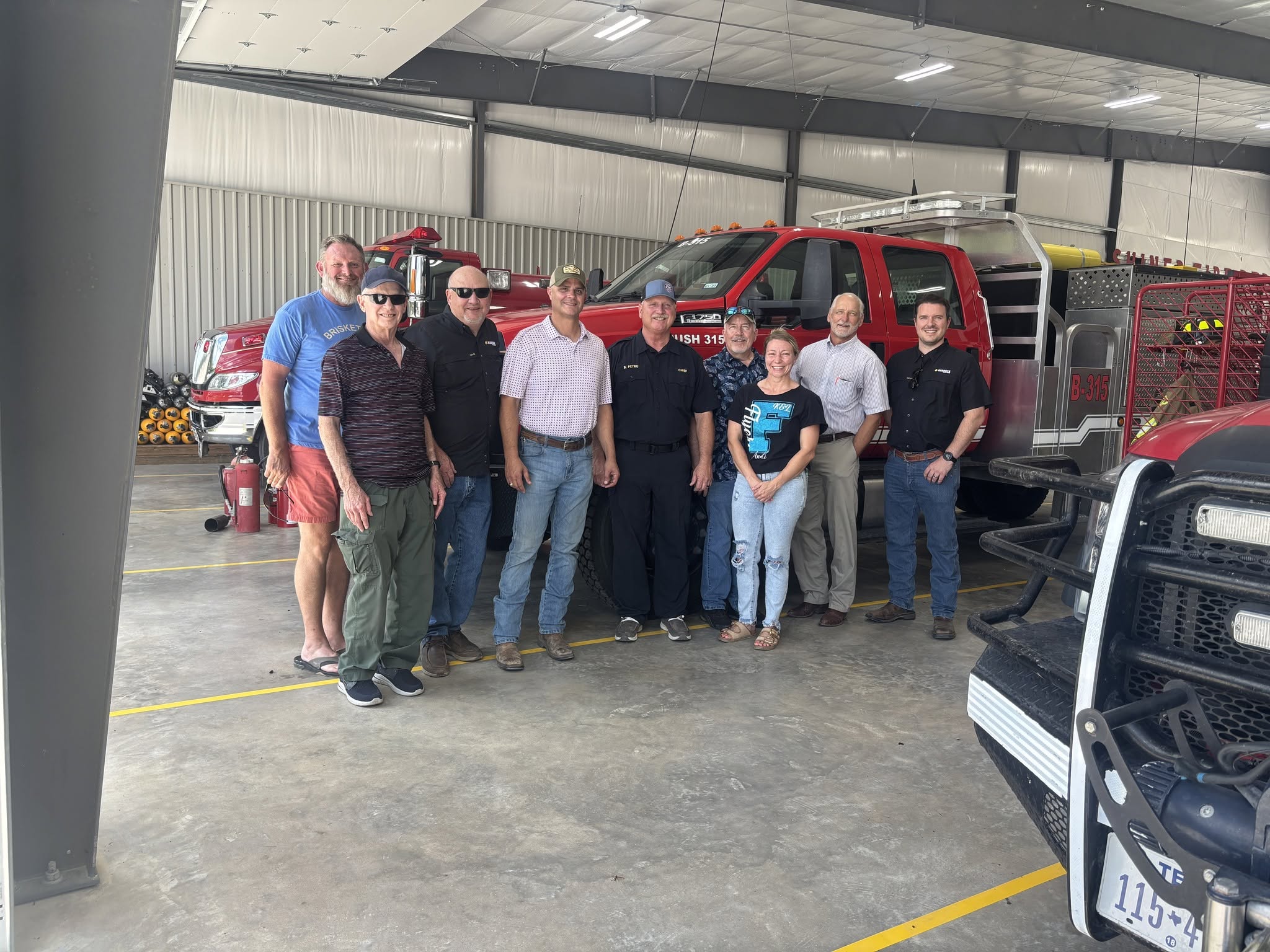 Shiner Rotary members visiting the Shiner Volunteer Fire Department’s new station